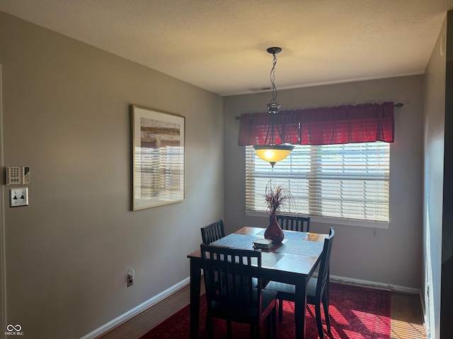 11632 Coastal Way, Indianapolis, IN 46229 - dining space featuring wood finished floors and a textured ceiling