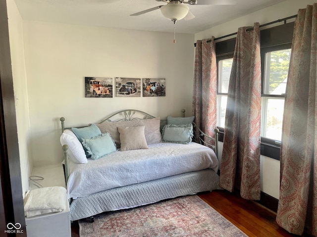 251 N St, Danville, IN 46122 - bedroom with wood finished floors and a ceiling fan