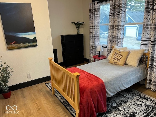 251 N St, Danville, IN 46122 - bedroom with wood finished floors and baseboards