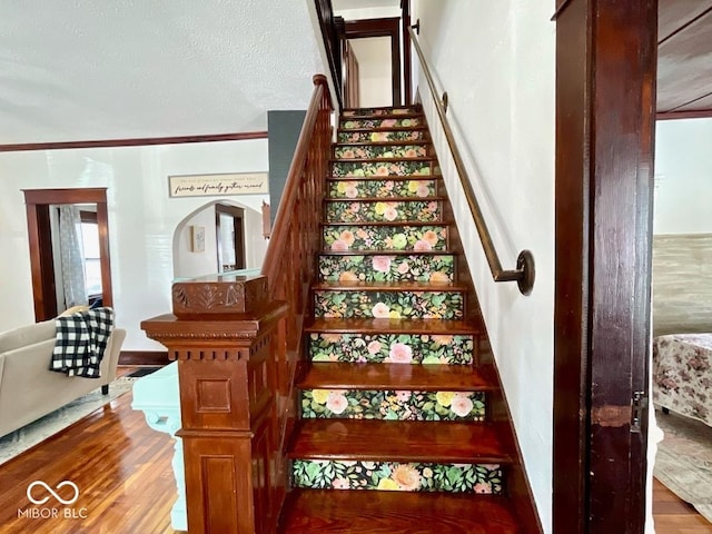 251 N St, Danville, IN 46122 - stairs with wood finished floors and a textured ceiling