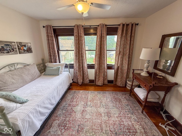 251 N St, Danville, IN 46122 - bedroom with wood finished floors and a ceiling fan