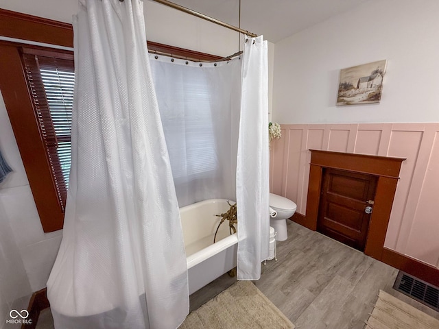 251 N St, Danville, IN 46122 - full bath with wood finished floors and shower / bath combo