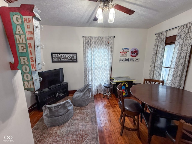 251 N St, Danville, IN 46122 - dining room with a ceiling fan, hardwood / wood-style flooring, and a textured ceiling