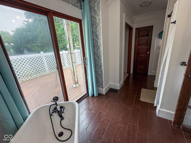 251 N St, Danville, IN 46122 - doorway to outside with dark wood-type flooring and crown molding