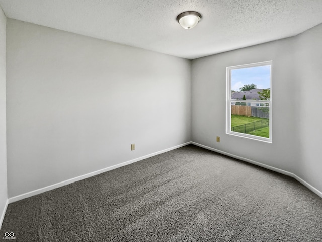 3445 Brandenburg Blvd, Indianapolis, IN 46239 - spare room featuring carpet and a textured ceiling