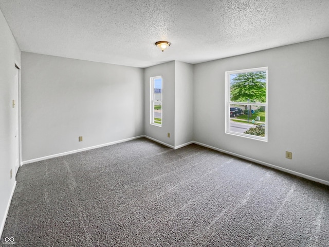3445 Brandenburg Blvd, Indianapolis, IN 46239 - carpeted empty room featuring a textured ceiling and baseboards