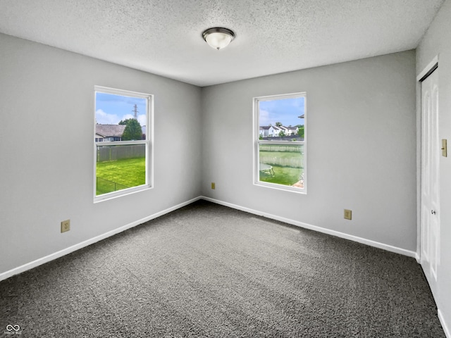 3445 Brandenburg Blvd, Indianapolis, IN 46239 - unfurnished room featuring carpet floors and a textured ceiling