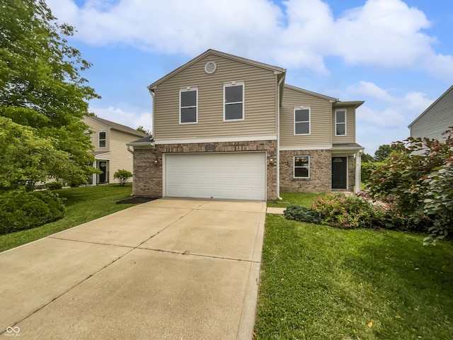 3445 Brandenburg Blvd, Indianapolis, IN 46239 - traditional home with a garage, a front lawn, driveway, and brick siding