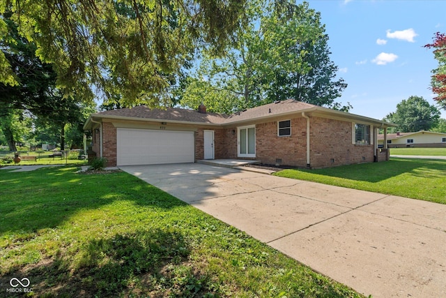 802 Lawrence Ave, Indianapolis, IN 46227 - ranch-style house featuring brick siding, a garage, concrete driveway, and a front yard