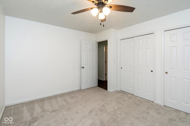 802 Lawrence Ave, Indianapolis, IN 46227 - unfurnished bedroom with carpet floors and a ceiling fan