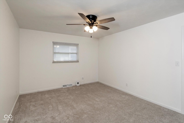 802 Lawrence Ave, Indianapolis, IN 46227 - empty room with light carpet and ceiling fan