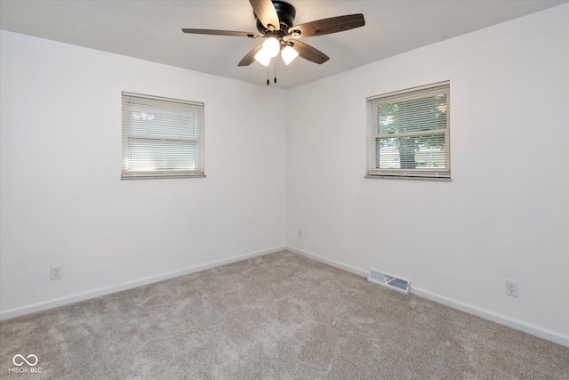 802 Lawrence Ave, Indianapolis, IN 46227 - carpeted spare room with ceiling fan and baseboards