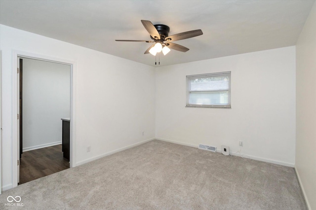 802 Lawrence Ave, Indianapolis, IN 46227 - empty room with carpet and ceiling fan