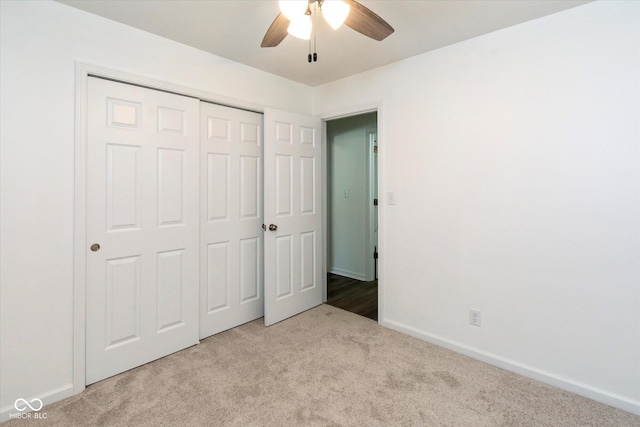 802 Lawrence Ave, Indianapolis, IN 46227 - unfurnished bedroom with carpet flooring, a closet, and ceiling fan