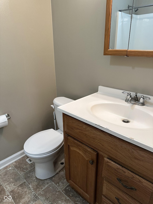 1108 Pierce Dr, Plainfield, IN 46168 - bathroom with vanity, stone finish floors, and a shower