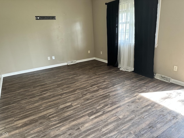 1108 Pierce Dr, Plainfield, IN 46168 - empty room with baseboards and dark wood-style floors