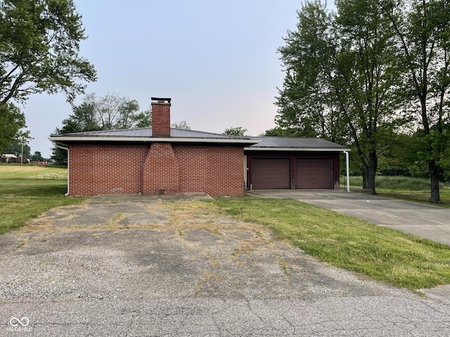 406 N Main St, Cloverdale, IN 46120 - garage featuring driveway