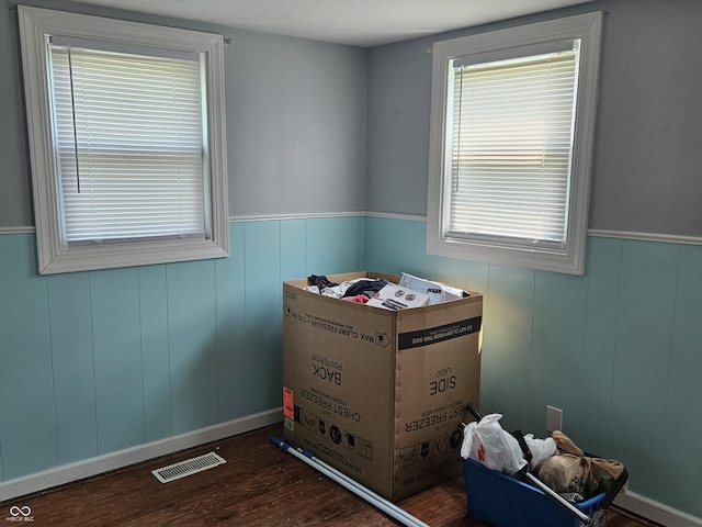 1601 S Biltmore Ave, Muncie, IN 47302 - bedroom featuring wood finished floors and a wainscoted wall