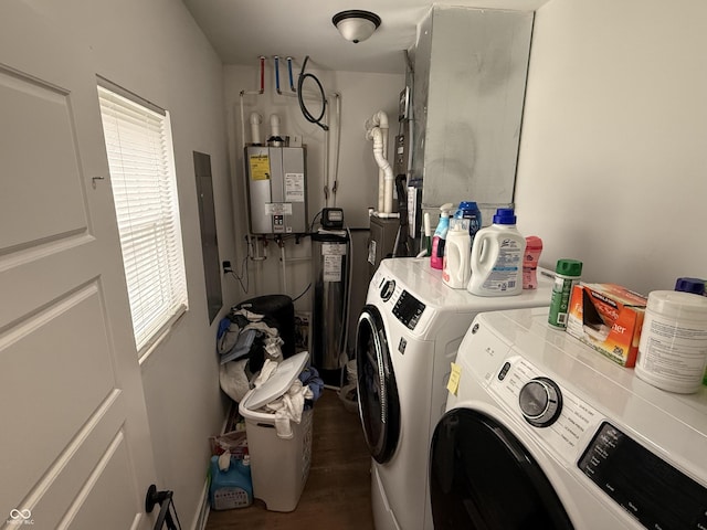 1720 Rembrandt St, Indianapolis, IN 46202 - laundry room with washing machine and clothes dryer, gas water heater, healthy amount of natural light, and wood finished floors