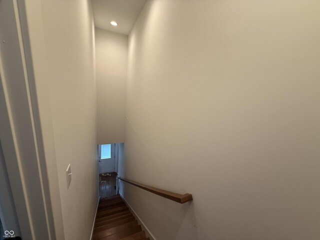 1720 Rembrandt St, Indianapolis, IN 46202 - stairs featuring wood finished floors and recessed lighting