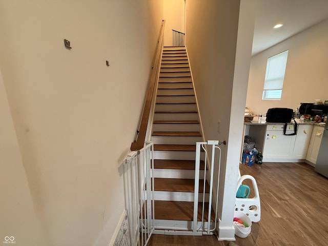1720 Rembrandt St, Indianapolis, IN 46202 - staircase with wood finished floors