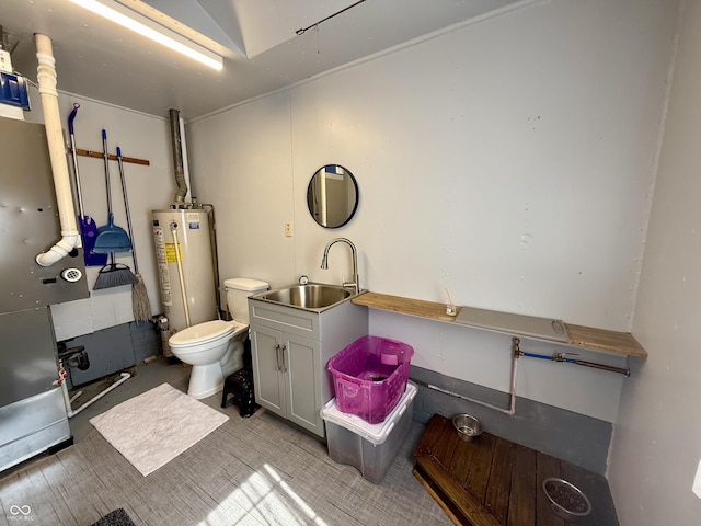 820 N Broadway St, Greensburg, IN 47240 - bathroom with gas water heater, vanity, and vaulted ceiling