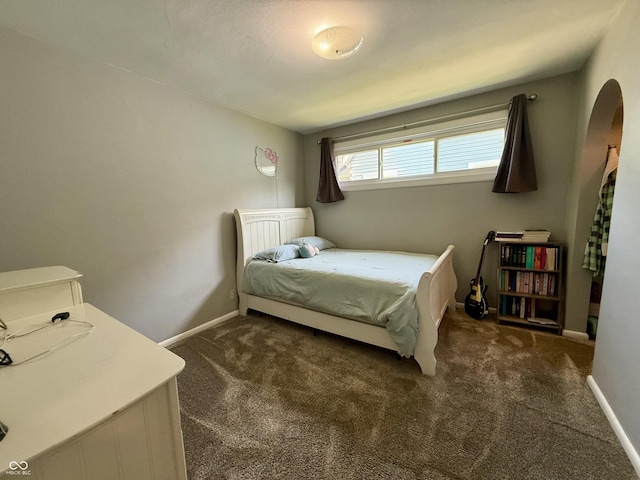 820 N Broadway St, Greensburg, IN 47240 - bedroom featuring dark carpet and baseboards