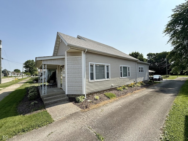 820 N Broadway St, Greensburg, IN 47240 - view of side of home featuring roof with shingles