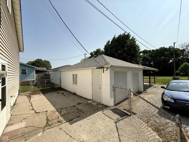 820 N Broadway St, Greensburg, IN 47240 - detached garage featuring a gate