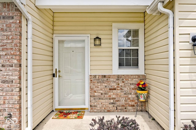 11320 Lynchburg Way, Indianapolis, IN 46229 - doorway to property featuring brick siding