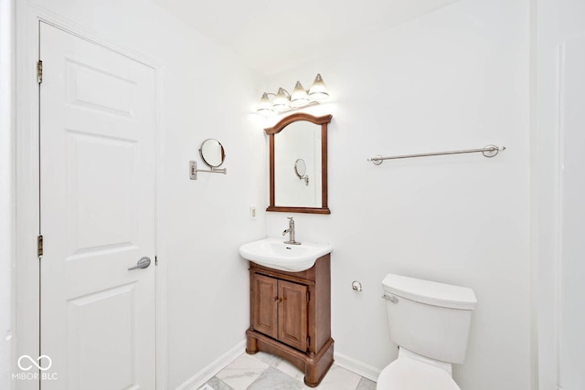 11320 Lynchburg Way, Indianapolis, IN 46229 - half bathroom featuring vanity and marble look tile flooring