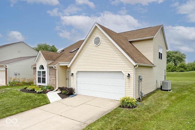 11320 Lynchburg Way, Indianapolis, IN 46229 - traditional-style home featuring concrete driveway, a front lawn, an attached garage, and roof with shingles