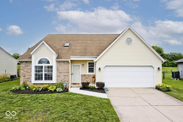 11320 Lynchburg Way, Indianapolis, IN 46229 - view of front of property featuring a front lawn, concrete driveway, and brick siding