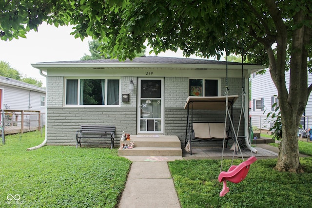 219 N 9th Ave, Beech Grove, IN 46107 - bungalow-style house with brick siding