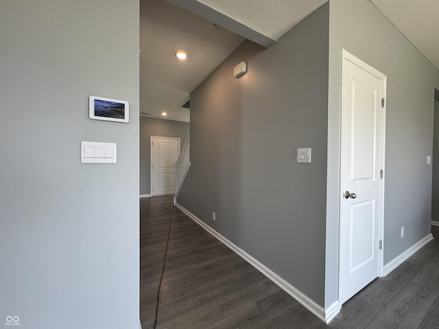 8969 Faulkner Dr, Indianapolis, IN 46239 - hall with dark wood-type flooring and recessed lighting