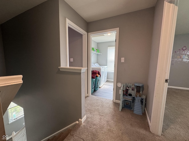 8969 Faulkner Dr, Indianapolis, IN 46239 - hall with separate washer and dryer and carpet flooring