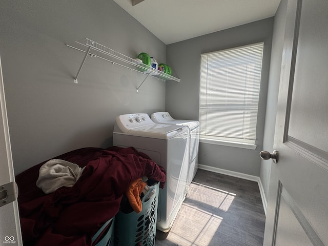 8969 Faulkner Dr, Indianapolis, IN 46239 - laundry room with separate washer and dryer, wood finished floors, and plenty of natural light