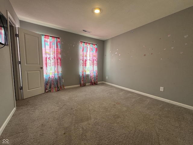 8969 Faulkner Dr, Indianapolis, IN 46239 - spare room featuring carpet floors and baseboards