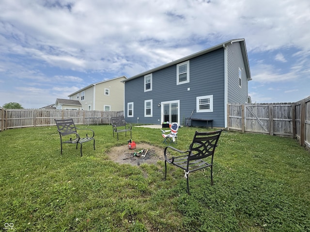 8969 Faulkner Dr, Indianapolis, IN 46239 - rear view of property featuring a fenced backyard