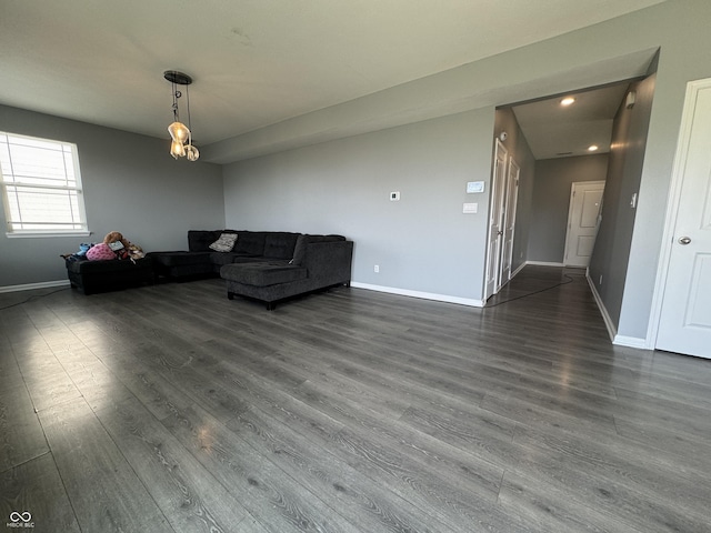 8969 Faulkner Dr, Indianapolis, IN 46239 - living area featuring dark wood finished floors and recessed lighting