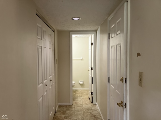 7667 Madden Ln, Fishers, IN 46038 - hallway featuring baseboards