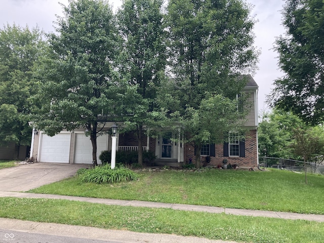 7667 Madden Ln, Fishers, IN 46038 - view of property hidden behind natural elements featuring brick siding, concrete driveway, and a garage