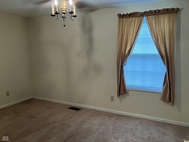 7667 Madden Ln, Fishers, IN 46038 - empty room featuring carpet floors and a chandelier