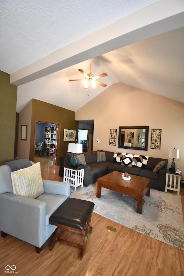 5943 Red Maple Dr, Indianapolis, IN 46237 - living room with wood finished floors, vaulted ceiling, and a ceiling fan