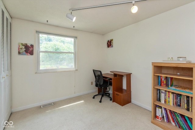 5802 Rymark Ct, Indianapolis, IN 46250 - carpeted office space featuring track lighting and baseboards