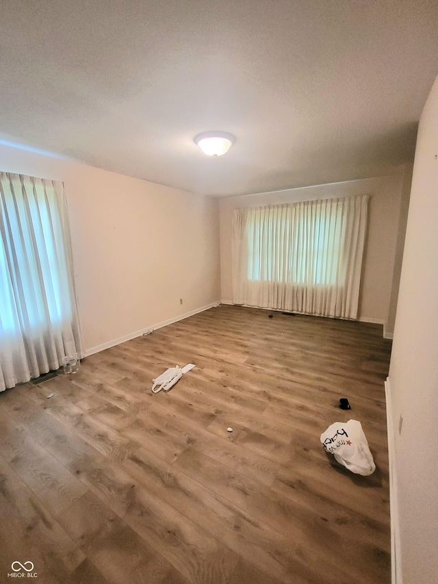 7576 S Carlisle St, Terre Haute, IN 47802 - unfurnished room with wood finished floors