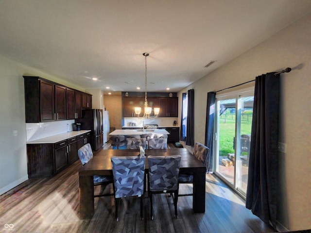 4216 Lauder Rd, Bargersville, IN 46106 - dining area with dark wood finished floors, a chandelier, and recessed lighting