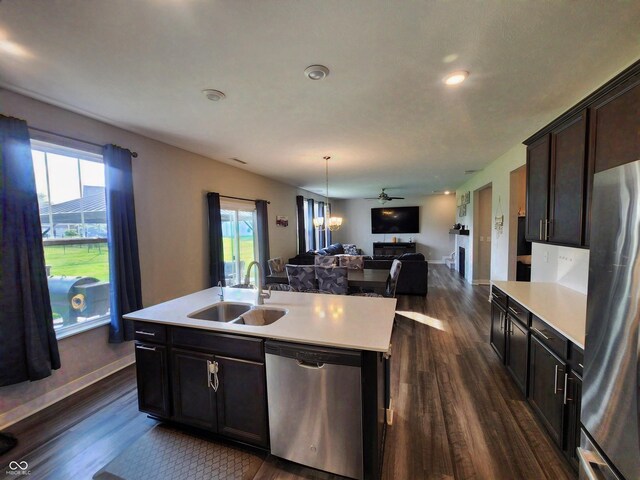 4216 Lauder Rd, Bargersville, IN 46106 - kitchen featuring appliances with stainless steel finishes, dark wood-type flooring, open floor plan, light countertops, and recessed lighting