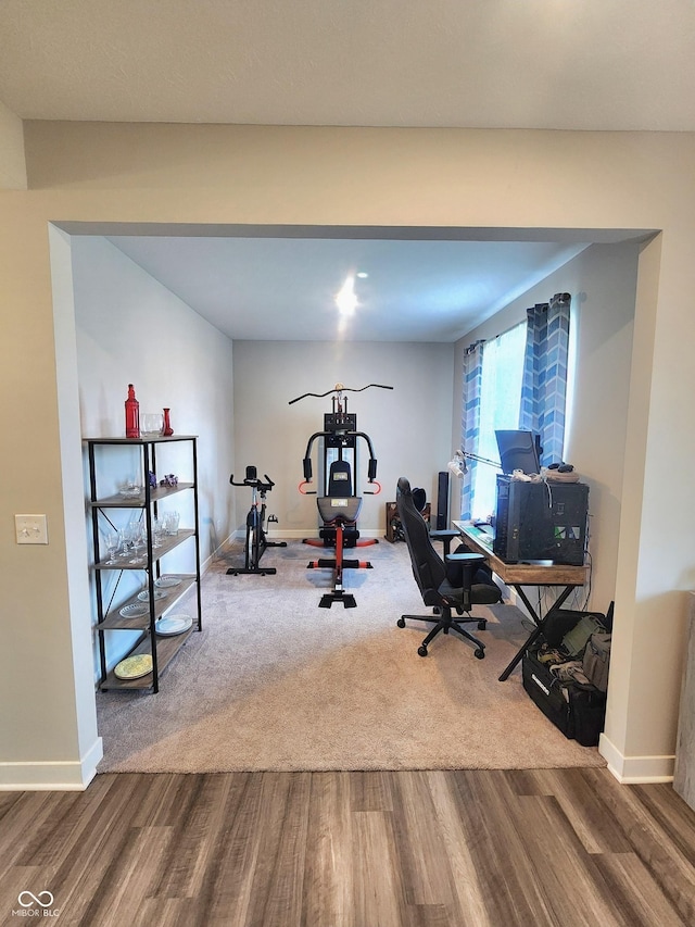 4216 Lauder Rd, Bargersville, IN 46106 - exercise room with wood finished floors and baseboards
