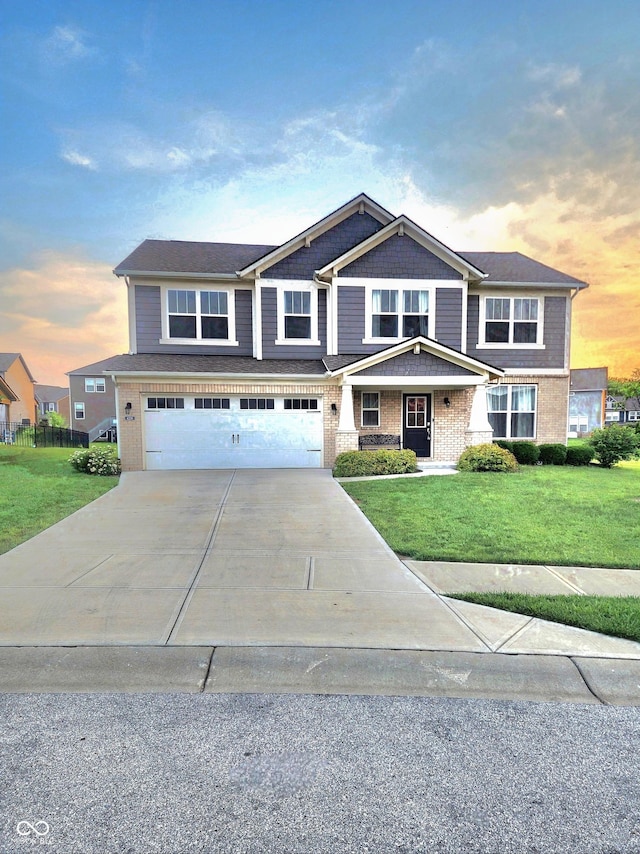 4216 Lauder Rd, Bargersville, IN 46106 - view of front of property featuring a garage, concrete driveway, and a front yard